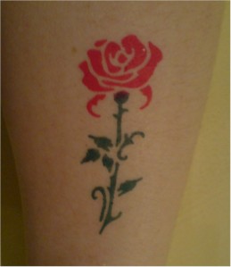 Red Rose Arm Tattoo. Red Rose Arm Tattoo Royalty-free floral clipart picture